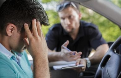 Police officer speaking about ticket