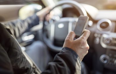 Using,A,Phone,In,A,Car,Texting,While,Driving,Concept