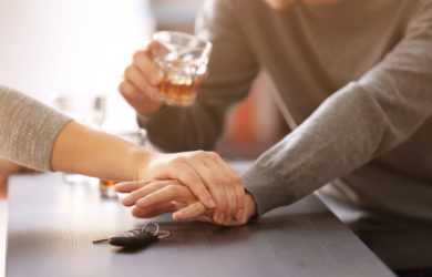 bartender, preventing, man, from, drinking, and, driving
