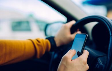 man, using, phone, while, driving